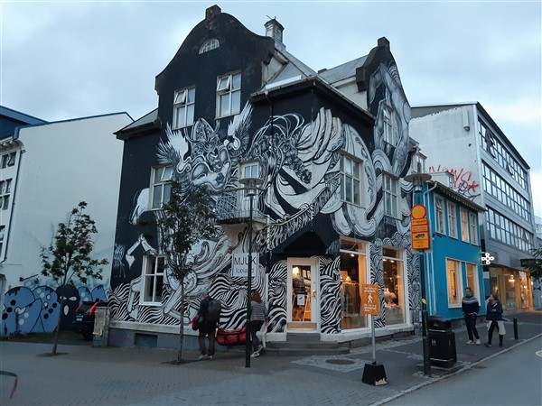 a building with a mural on the side of it